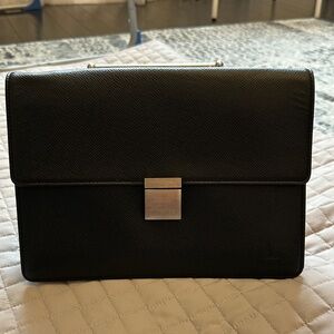 Louis Vuitton Black Leather Clutch with Silver-Tone Lock. Unisex